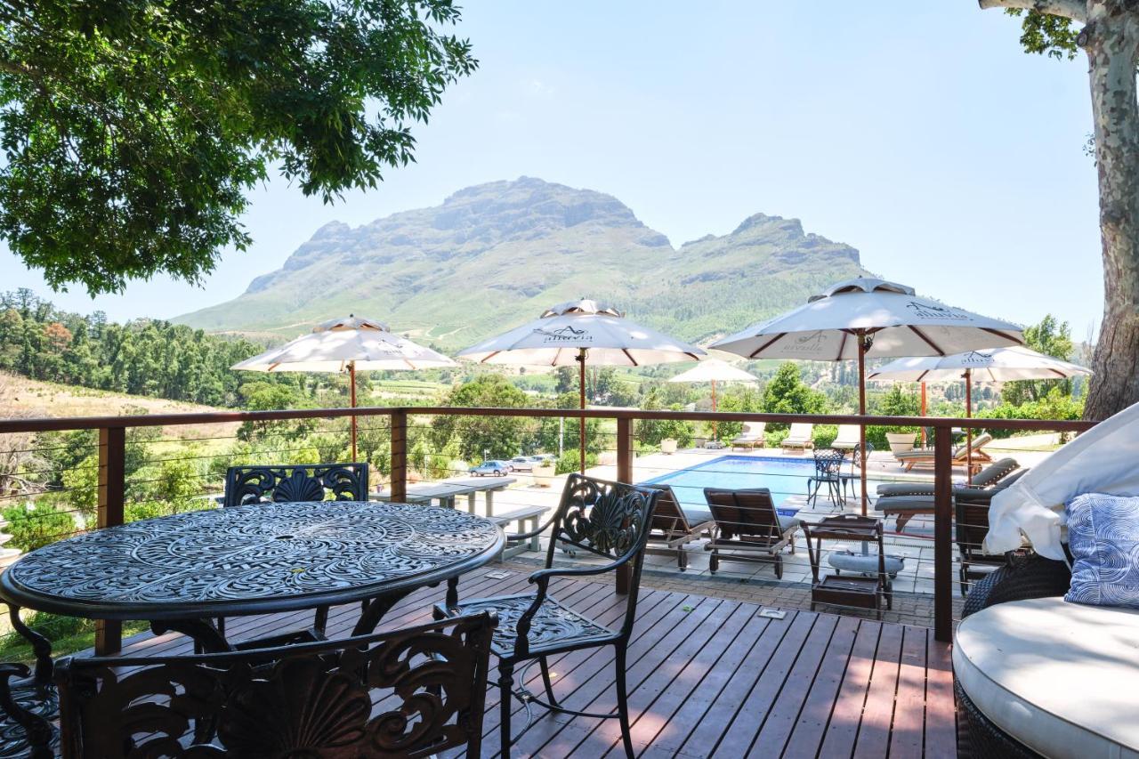Alluvia Boutique Winery & Luxury Accommodation Stellenbosch Ngoại thất bức ảnh View of the Three Sisters from the deck of the restaurant at the Boschendal Wine Estate