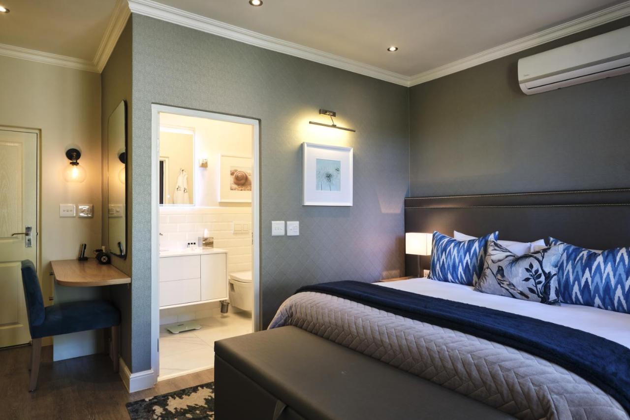 Alluvia Boutique Winery & Luxury Accommodation Stellenbosch Ngoại thất bức ảnh A bedroom at the Oyster Box